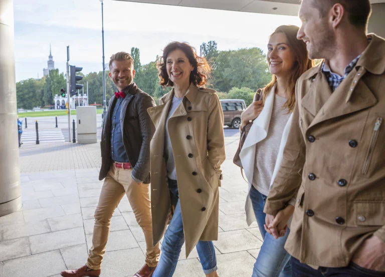 four-mid-adult-friends-walking-together-2025-04-04-19-56-00-utc